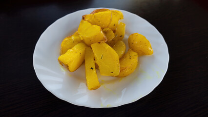 Potatoes in a rustic way. Potatoes in the oven. Photos for the menu. H