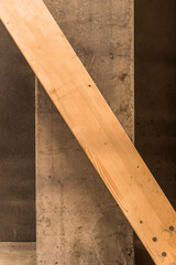 Concrete column with wooden stabilizer