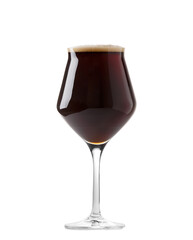 Glass of dark beer with foam isolated on white background