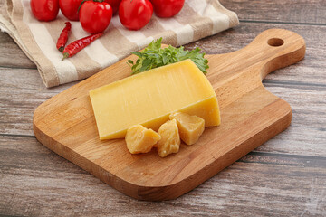 Parmesan hard cheese with small pieces