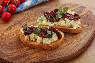 Bruschetta with soft cheese and tomato