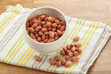 Raw peanut heap in the bowl