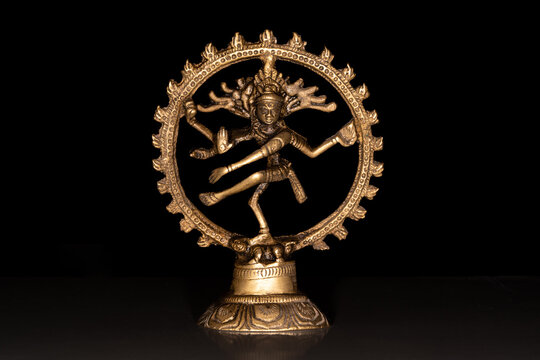 Statue of indian hindu god dancing Shiva Nataraja. isolated on black background
