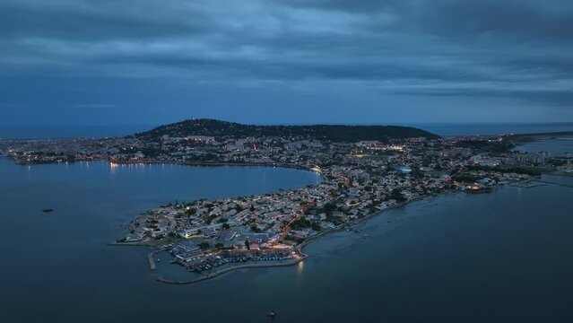 Sète lit up from above: Canals, seafood, and Paul Valéry's hometown.
