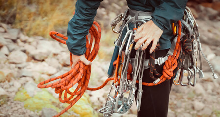 Young girl with climbing equipment