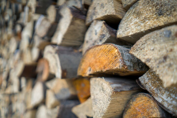 Background with old wooden boards, harvested firewood.