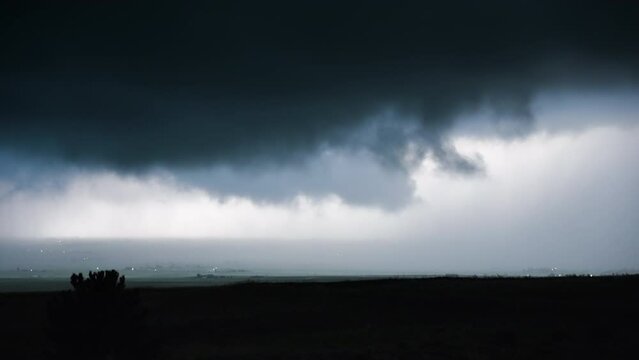 Dark Clouds Sweeping Across Open Country Side Stormy Dramatic Scene