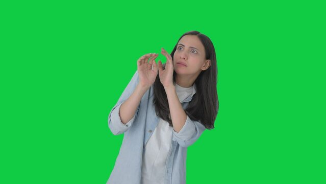 Indian girl scared of something Green screen