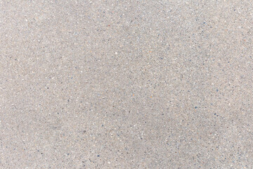 Texture background. Grunge textured concrete material surface with stones and sand.