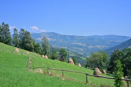 Haystacks at mountain, during summer time
