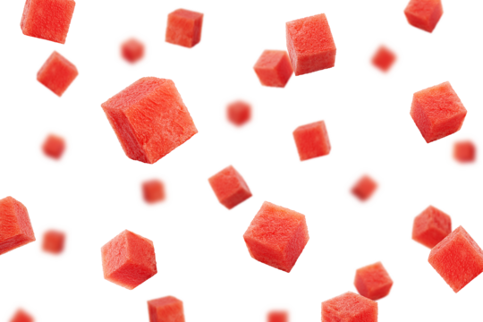 Falling Watermelon cubes isolated on white background, selective focus