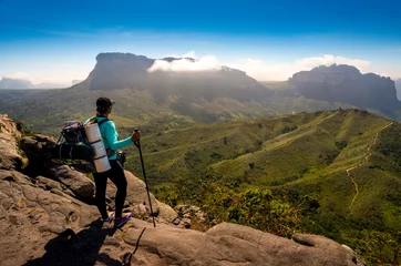 Cercles muraux Brésil adventurous woman with backpack looking at a beautiful green valley,vale do paty, chapada diamantina, Brazil
