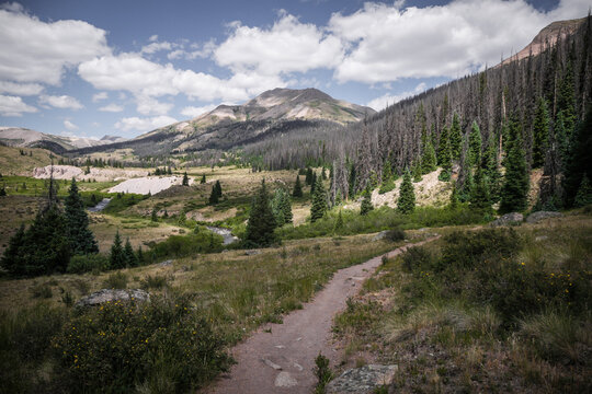 Bike trail overlooking Pole Creek and beautiful mountain range near towns of Creede and Lake City Colorado 