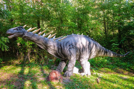 Belgorod, Russia - September 10, 2022: Statue of amargasaurus in the forest. Dinopark of Belgorod city.