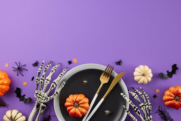 Intertwining a hint of Halloween enchantment into your table setup. Top view shot of plates,...
