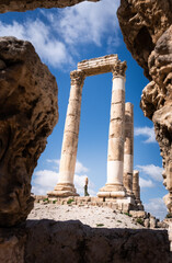 Travel blonde woman in the Temple of Hercules in Amman. Ancient Roman city in Jordan