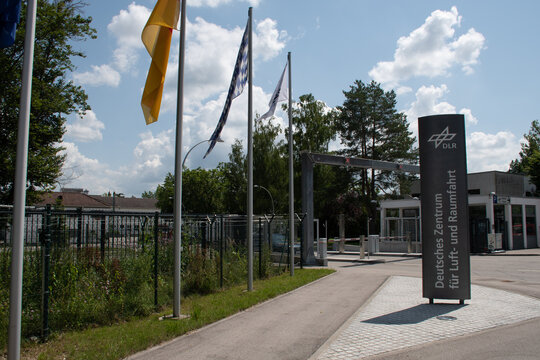 Oberpfaffenhofen, Germany - July 19, 2021: Entrance of a site of the Deutsches Zentrum f&uuml;r Luft- und Raumfahrt (German Aerospace Center), Germany's research center for aeronautics and space.