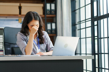 Financial Recession Struggles, stressed businessperson surrounded by declining charts and graphs, representing challenges faced by Finance People during economic downturns. Disappointment in Business