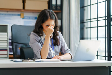 Financial Recession Struggles, stressed businessperson surrounded by declining charts and graphs, representing challenges faced by Finance People during economic downturns. Disappointment in Business
