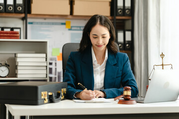 Pretty asian indian business woman as legal services across the board, legal consultant assisting...