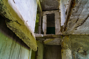 Destroyed panel building of a residential multi-storey and multi-apartment building. Background with selective focus