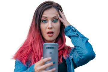 amazed woman on the street with mobile phone