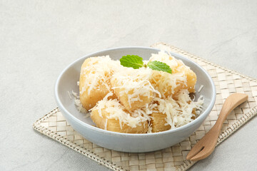 Fried cassava with cheese or singkong goreng keju, Indonesian traditional food. 
