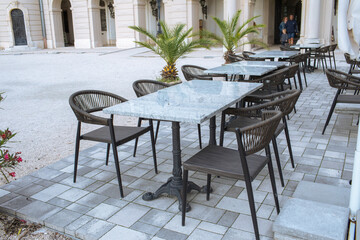Restaurant outdoor terrace in city centre.Summer season