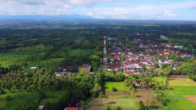 rural footage in Indonesia, rural atmosphere in East Java, Indonesia from a height using a 4k drone, jawa timur indonesia.