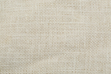 Texture of burlap fabric as background, top view