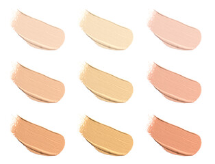 Different shades of liquid skin foundation on white background, top view. Set with samples of makeup product