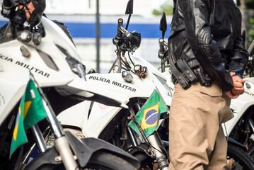 A military police soldier is seen standing next to police motorcycles during the Brazilian...