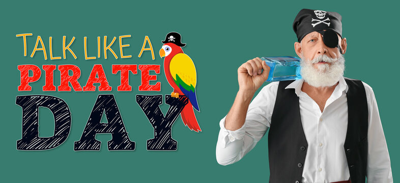 Mature pirate with alcohol on green background. Talk Like a Pirate Day
