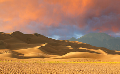 Great Sand Dunes National Park and Preserve at sunset, Alamosa, Colorado. The park is in southern Colorado and known for huge dunes.