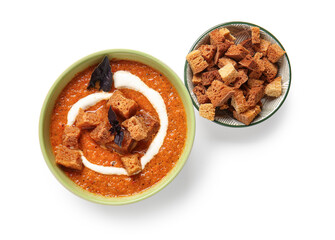 Bowl of tasty cream soup with croutons on white background