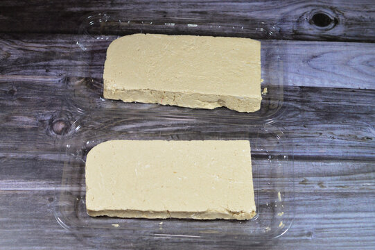 Traditional plain tahini halva or Halawa Tahiniya, the primary ingredients in this confection are sesame butter or paste (tahini), and sugar, glucose or honey, it is basic tahini and sugar base