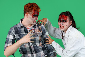 Scary zombies on green background