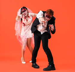 Zombie wedding couple on orange background