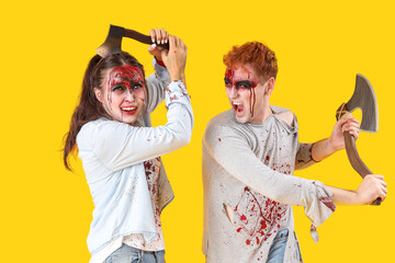 Scary zombies with axes on yellow background