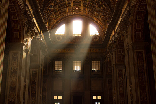 rays of light going through st peter church vatican window