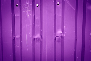 Old metal painted texture. Purple painted background.