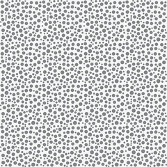 seamless texture of fabric using different sizes of dotted shapes