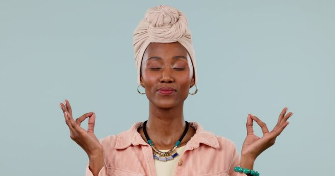Lotus, meditation and black woman, yoga and wellness with mindfulness and zen isolated on blue background. Breathing, peace and calm, healthy mind and spirit with healing and holistic in a studio