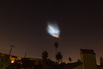 Space X Falcon 9 taking off from California carrying satellites to space 