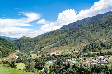 Fototapeta na wymiar Quaint settlement nestled amidst pristine nature in Bhutan