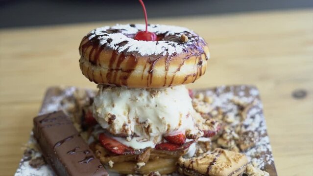donut dessert with ice cream, cookie and strawberries, sweet, cake