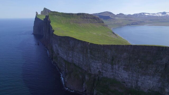 Drone Flight over the coast and cliffs of Hornstrandir nature reserve in the Wilderness of northern Iceland. Dramatic landscape.