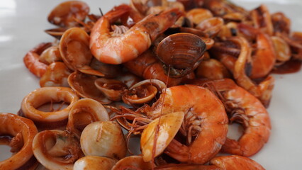bucket seafood mixed of prawn octopus and seashells