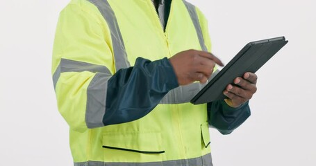 Hands, man and construction worker with tablet in studio for project management, contract checklist or design review. Contractor, person and builder scroll screen for building model and illustration