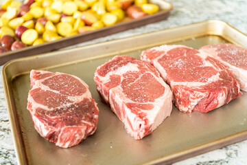 Fototapeta premium Seasoned Rib Eye Steak Ready for Grilling